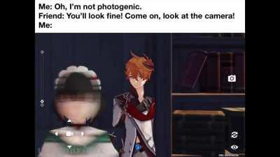 not that photogenic, is he? (- - ;)