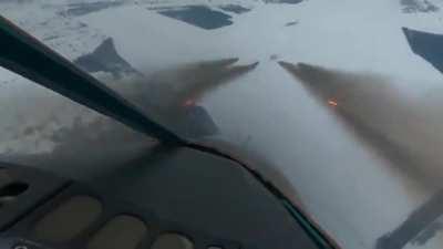 Su-34 firing S8 rockets at Ukrainians position.