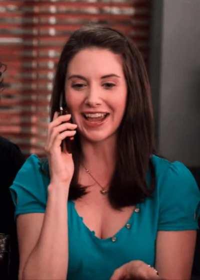 Annie using her phone as a phone