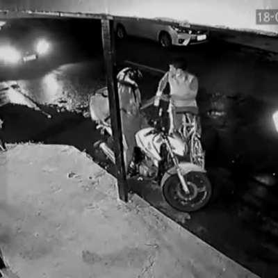 Driver sees robbery and drives car over thief