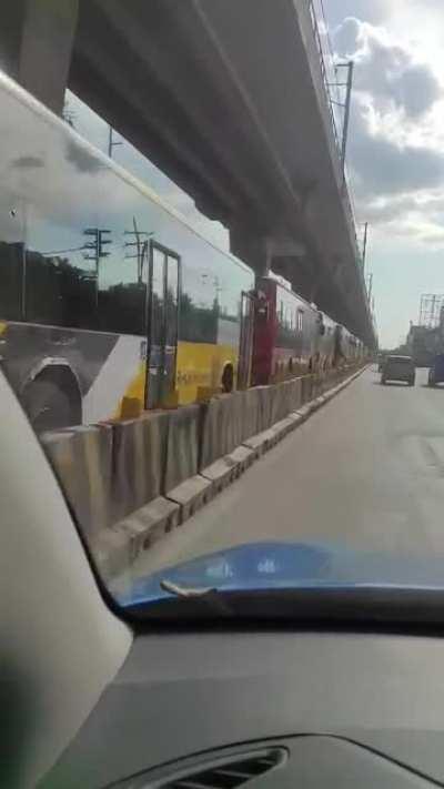 An SUV drove on the bus lane and God knows how long he'll be stuck there