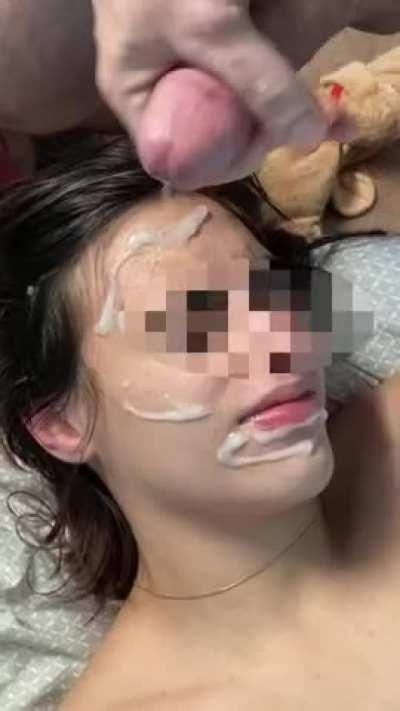 Massive Cumshot all over her face