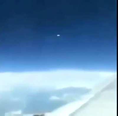 Probably the closest view of the tic-tac UFO yet - There are also a couple spheres around
