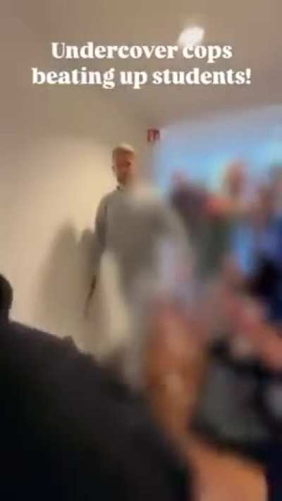 What seems to be Undercover cops attacking students/protesters. Unsure of where this happened