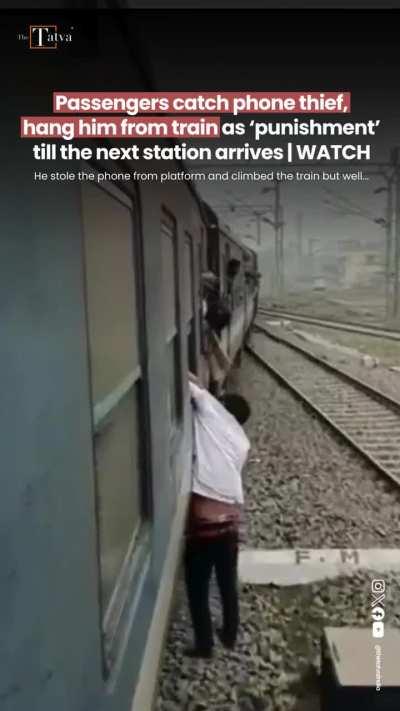 Passenger catches phone thief, hang him from train as punishment