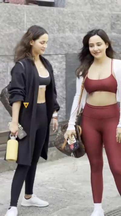 Neha sharma and Aisha sharma. dono behen chuche dikhane ke competition pe lagi hai