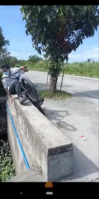 Yeah... What can go wrong doing a trick near a creek?