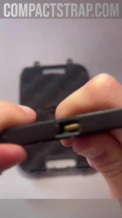 A mini pistol that can eject shells