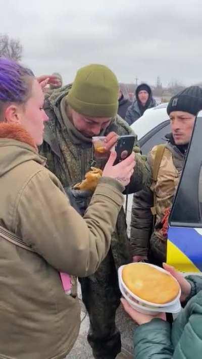 Russian Armed Forces soldier burst into tears after surrendering voluntarily. He was fed and given hot tea by the local Ukrainians