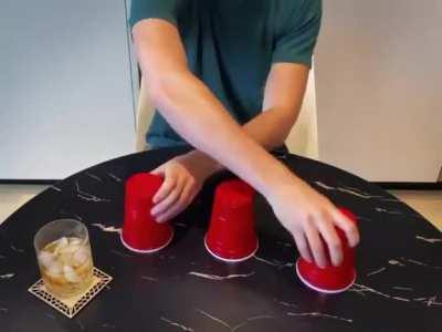 Keep your eye on which cup the ball is underneath