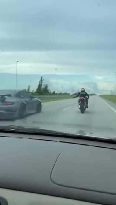 Porsche 911 turbo vs bike