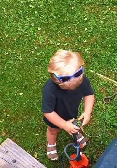 This kid imitating a weed whacker