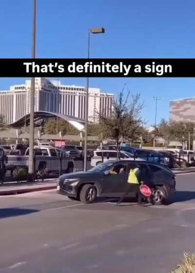 Crossing guard beats driver with stop sign