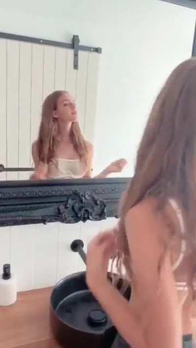 does anybody know where to find more of her shoots in see-through clothes?