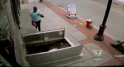 Woman staring at her phone falls into hole where they’re doing construction