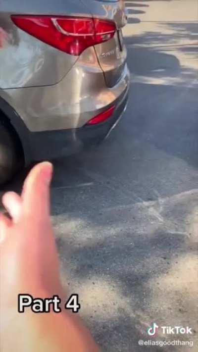 After a fender bender in the parking lot, the driver at fault keeps trying to avoid giving his insurance information. After a long winded debate, he finally goes into his car and hands over the information.