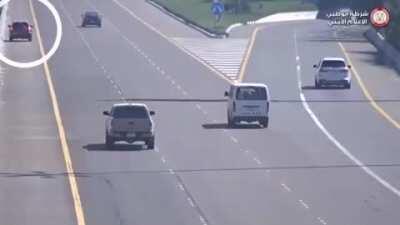 Motorist reverses on a highway after forgetting to take an exit