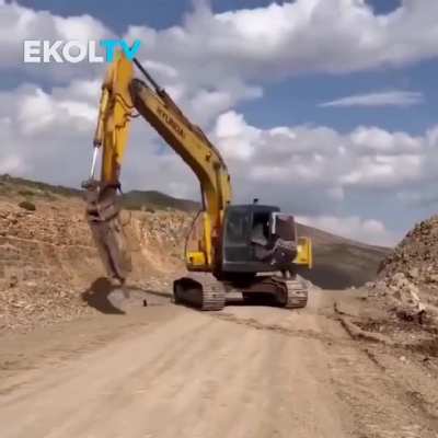 Man attempts to stop a out of control machine