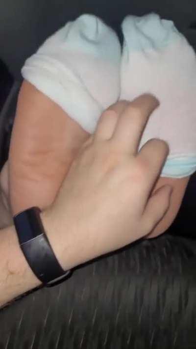 My feet tickled in the car. People and cars going by got a sneak preview