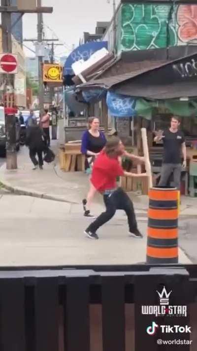Guy messes with man guarding a store
