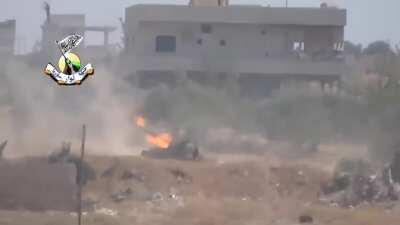 Opposition recoilless team engages and destroys a moving SAA tank near Wadi Deif - 7/9/2014