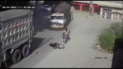 Two Men Try To Overtake Truck, Gets Run Over