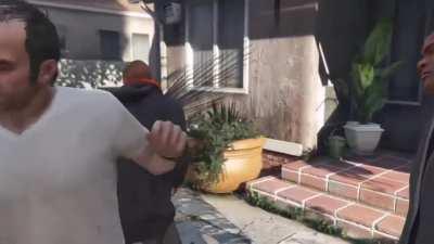 Random Guy Keeps Punching Trevor During Cutscene.