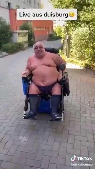 Old man freaks out on people walking past