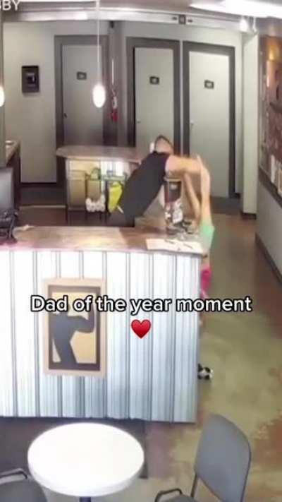 Dad saves daughter from falling head first from counter