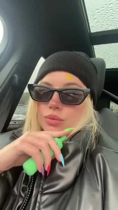 Vaping in her car