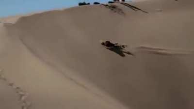 Sand surfing