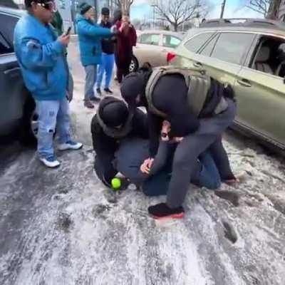 ICE agents detained a U.S. citizen legal observer in Minneapolis, smashing his car window, dragging him out, and placing a knee on his neck, conduct banned under Minnesota law after George Floyd.
