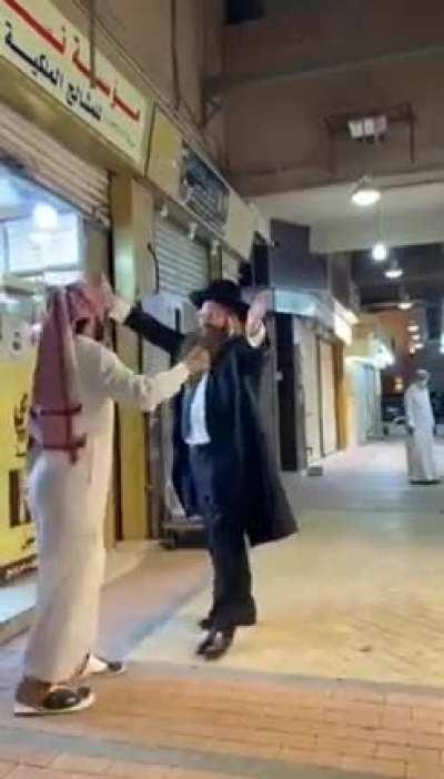 An Israeli Jewish Rabbi and a Saudi Muslim being total bros