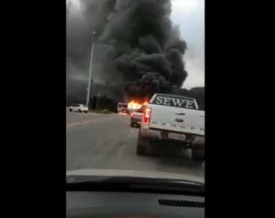 bus catches fire after colliding with fuel tanker