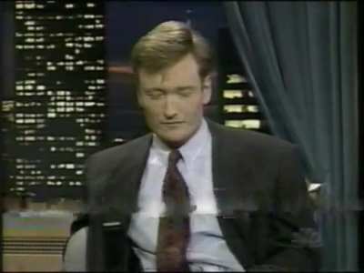 Conan O'Brien, in 1995, interviews actress Famke Janssen... who offers to show him the crushing signature move of 