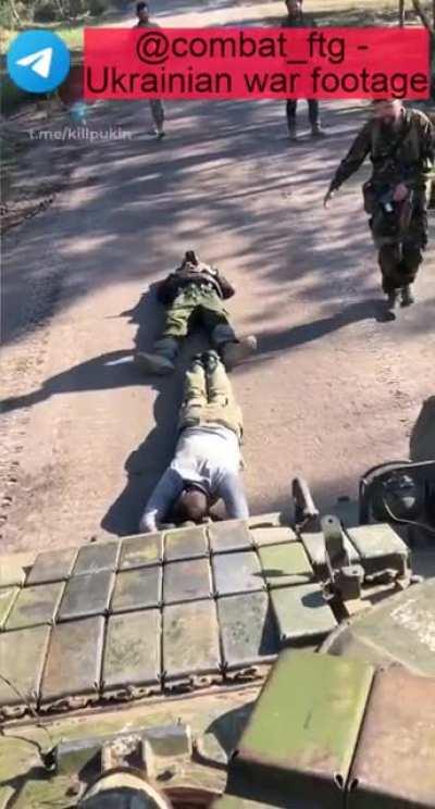 Ukrainian soldiers having fun with tank