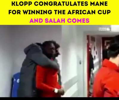 Klopp congratulates Mane for winning the African cup and Salah comes!