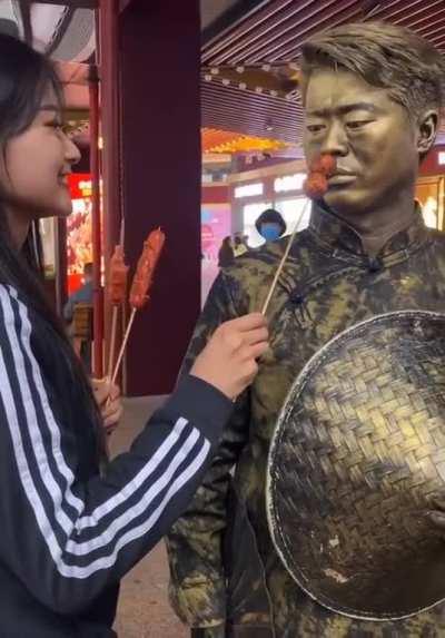 How to properly poke some fun with a living statue