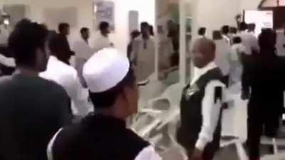 Awami League leader exposes fake Awami League freedom fighter who was born in 1965; crowd goes wild and fight breaks out.