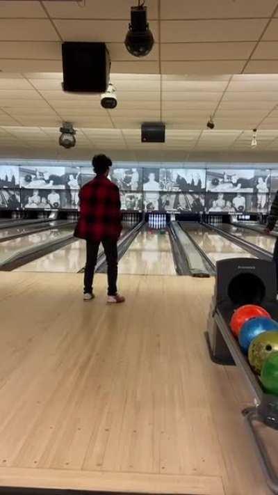 Bowling the spor- wait is he Celebrating a gutterball?