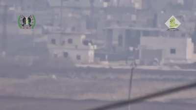 FSA BGM-71 TOW team hits a gathering of Harakat Hezbollah al-Nujaba (Iraqi Volunteers in Syria) on a balcony in Aleppo - 12/14/2015