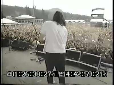 Gibby Haynes of The Butthole Surfers firing a shotgun over the audience at the final date of Lollapalooza, 1991
