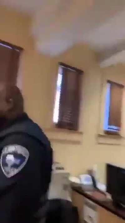 The only black elected constable in Ellis Texas office was moved to the basement with a sign that says negros above it.