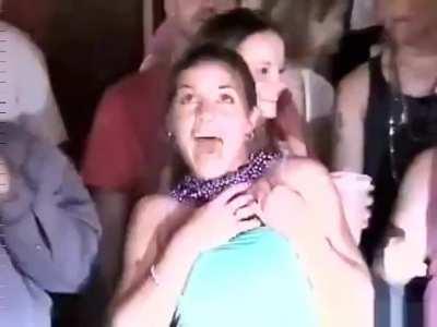 Blue top, big smile.