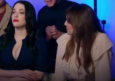 Elizabeth Olsen looking at Kat Dennings like all of us