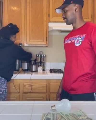 He looks sick of her