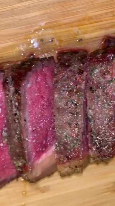 Reverse sear ribeye! Seasoned with homemade rosemary salt and freshly ground pepper. Smoked at 225F and then seared until 130F internal. No idea why the video is upside down but the steak came out great.