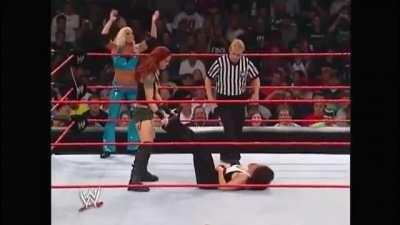 Lita with her stomp and headbutt routine on Molly