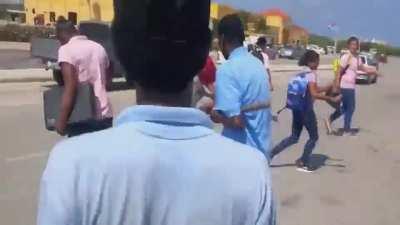 parent brings gardning tools 2 schoolfight