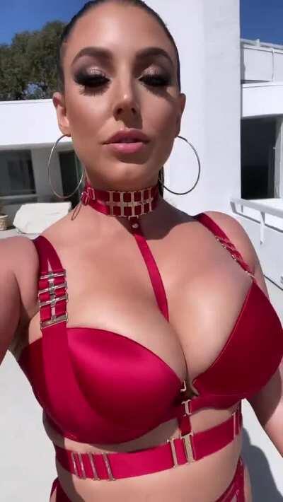 Angela white looking good in red outfit